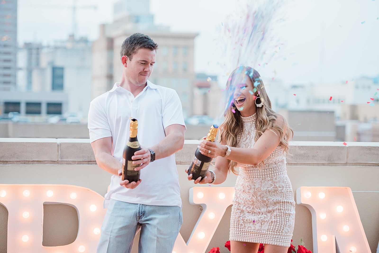 Champagne Poppers at Epic Summer Rooftop Proposal