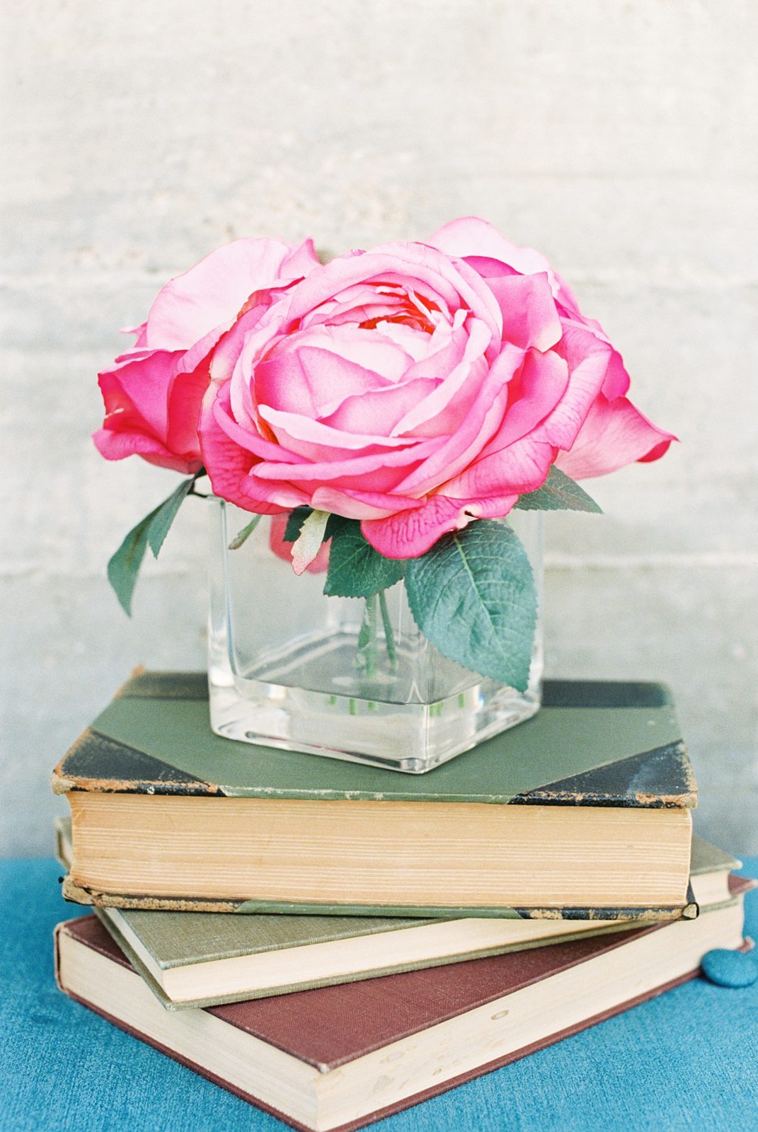 Bright Pink Flowers and Antique Books for Styling 