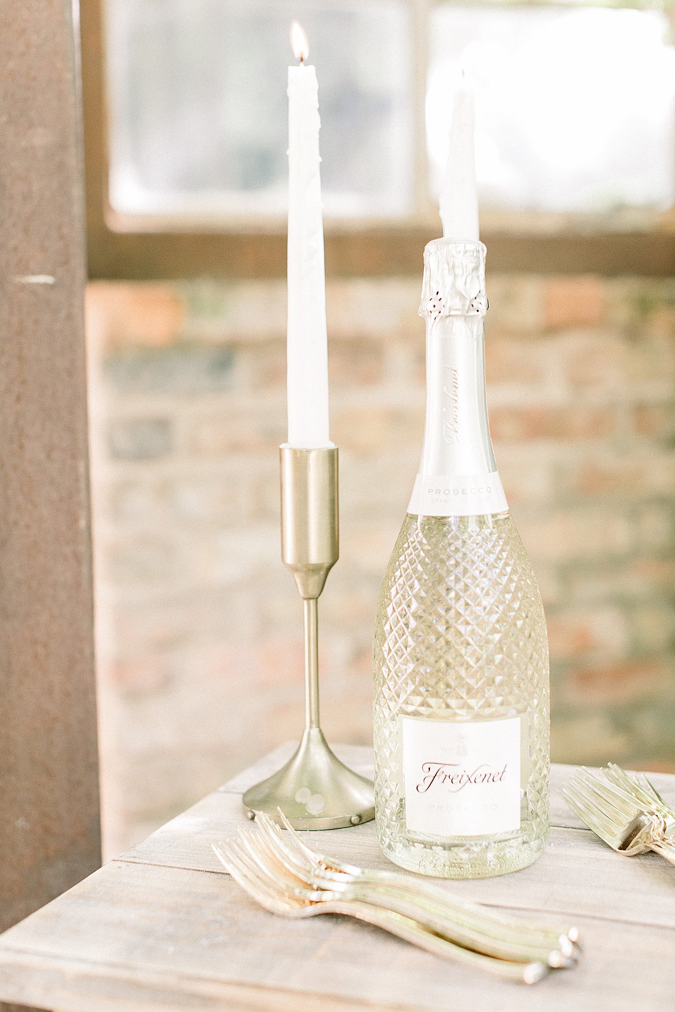 Champagne with Taper Candles for Weddings